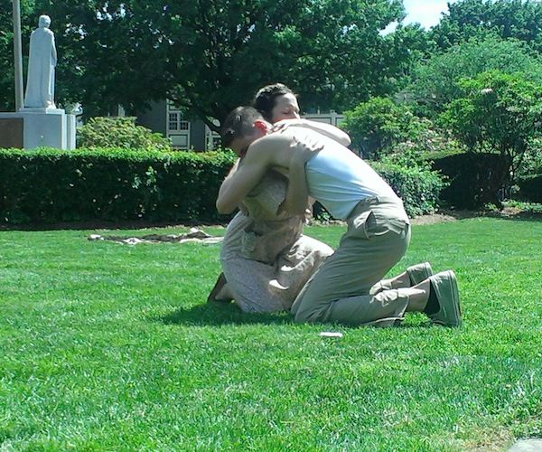 Bill and Tweed (Michael Kelly and Meg Di Maggio) embracing in the production of "The