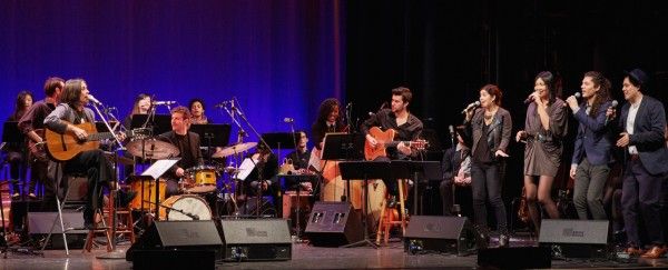 Students Miriam Elhajli Rodriguez, Yoshie Nakayama, Gerson Eguiguren, and Marco Mares singing with Joyce.