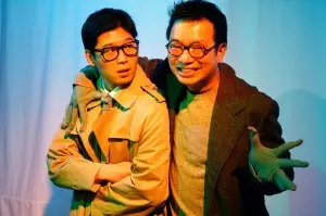 Frog (Mike Tow) embraces Katagiri (Martin Lee) in the Company One production of "After the Quake"