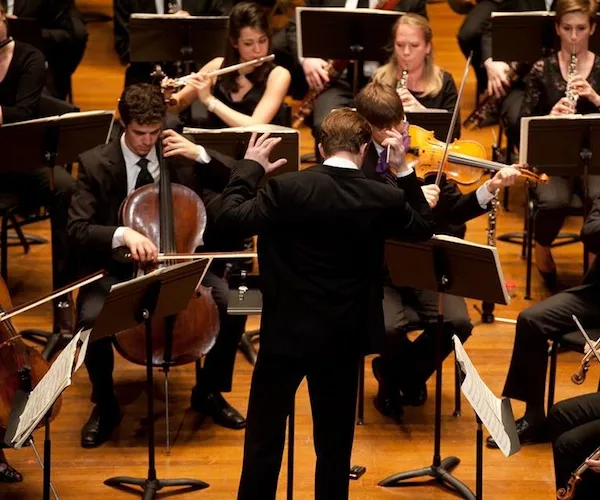 Courtney Lewis conducting Discovery Ensemble at Jordan Hall.
