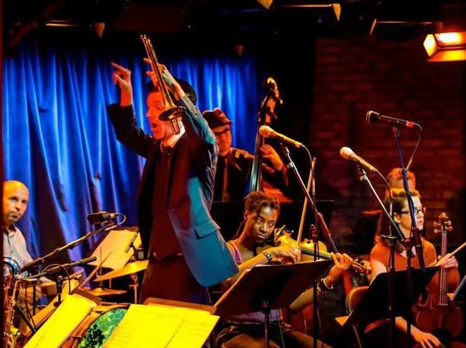 Brian Carpenter leading the Ghost Train Orchestra.