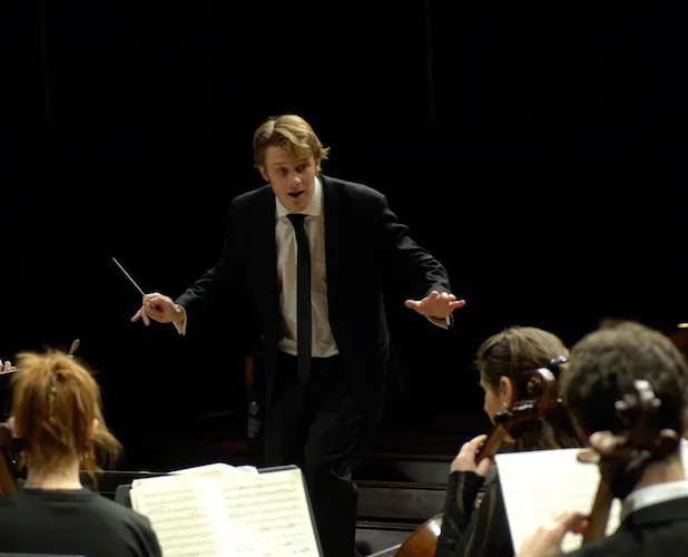 Discovery Ensemble conductor Courtney Lewis in action. Photo: Eric Antoniou.