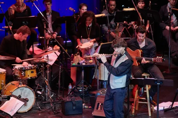 Brazilian Berklee students Raphael Lehnen (drums), Anne Nêgah Santos (percussion), and Edu Mercuri (guitar), with flutist and Berklee faculty member Fernando Brandão.